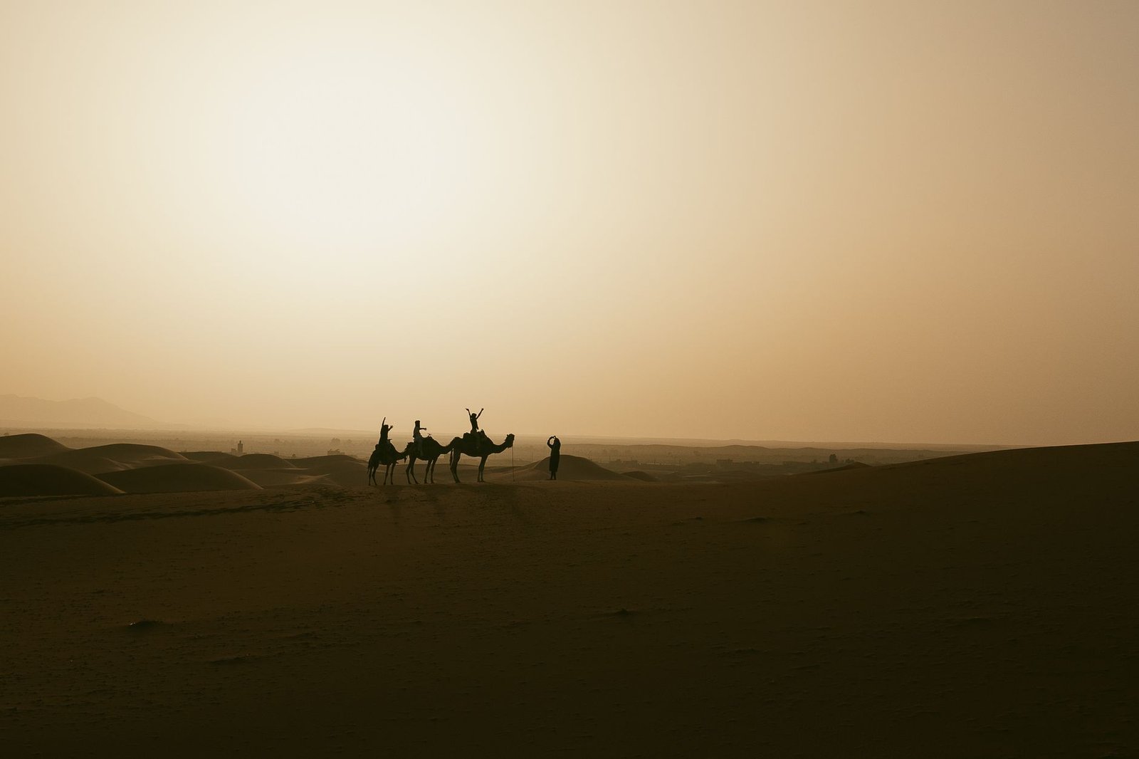 marrakech desert tours: 7 Best Routes and Experiences 5 Desert camp tents among Erg Chebbi dunes in Morocco during the evening